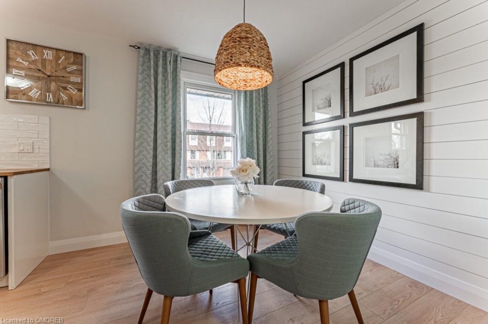 Dining room after, pendant light, shiplap wall, round table