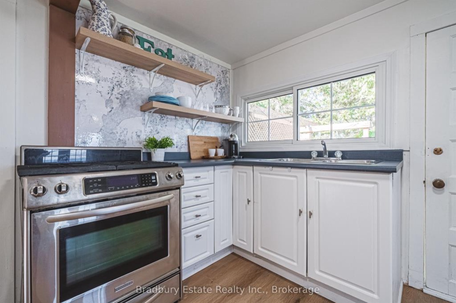 Kitchen after, painted cabinets and open shelving