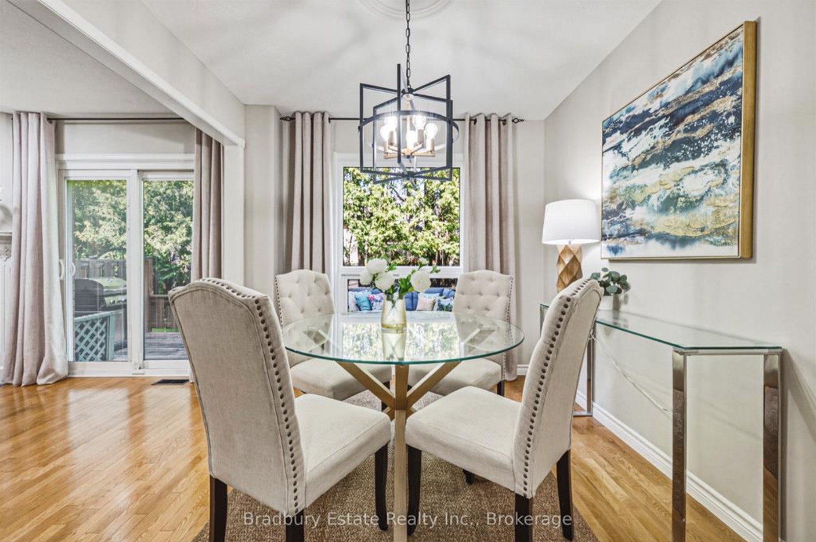 Dining room after, glass table and white chairs