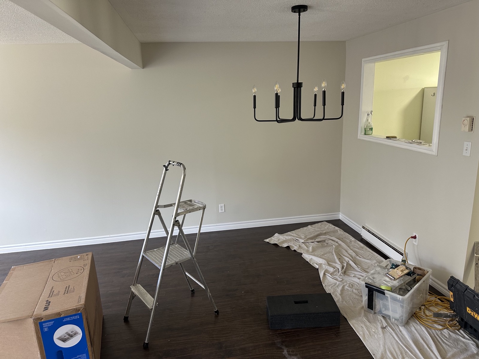 Dining room mid-job, a ladder and a drop sheet